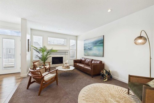 25 Evansglen Mews Nw, Calgary, AB - Indoor Photo Showing Living Room With Fireplace