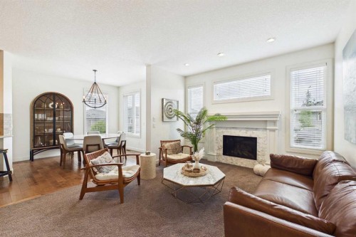 25 Evansglen Mews Nw, Calgary, AB - Indoor Photo Showing Living Room With Fireplace