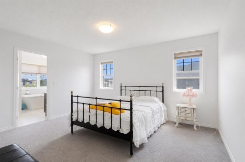 63 Carrington Manor Nw, Calgary, AB - Indoor Photo Showing Bedroom