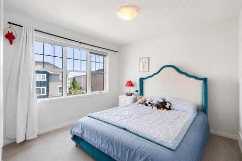 63 Carrington Manor Nw, Calgary, AB - Indoor Photo Showing Bedroom