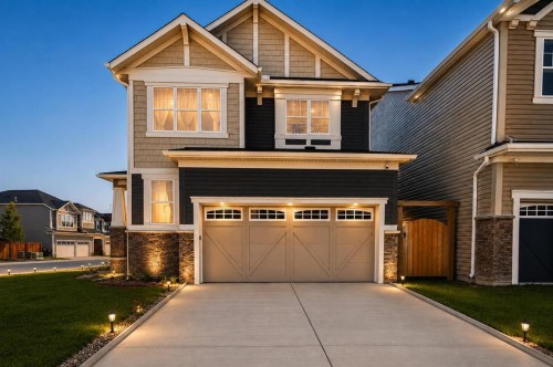 63 Carrington Manor Nw, Calgary, AB - Outdoor With Facade