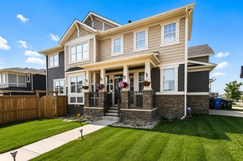 63 Carrington Manor Nw, Calgary, AB - Outdoor With Deck Patio Veranda With Facade
