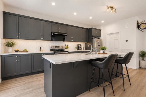 63 Carrington Manor Nw, Calgary, AB - Indoor Photo Showing Kitchen With Upgraded Kitchen