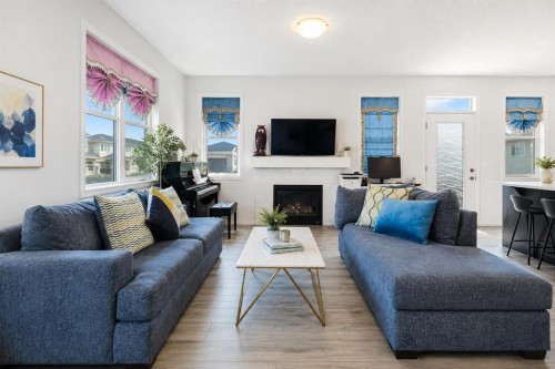 63 Carrington Manor Nw, Calgary, AB - Indoor Photo Showing Living Room With Fireplace