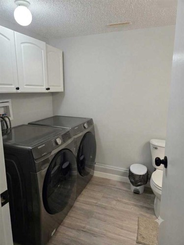 335 Covington Bay Ne, Calgary, AB - Indoor Photo Showing Laundry Room