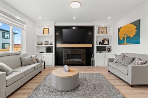 4524 87 Avenue Ne, Calgary, AB - Indoor Photo Showing Living Room With Fireplace