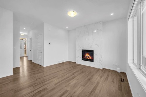 641 Southwinds Close Sw, Airdrie, AB - Indoor With Fireplace