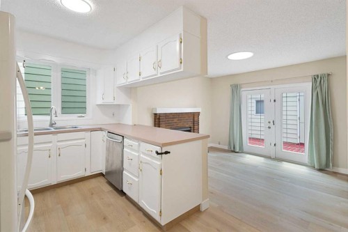1111 Berkley Drive Nw, Calgary, AB - Indoor Photo Showing Kitchen With Double Sink