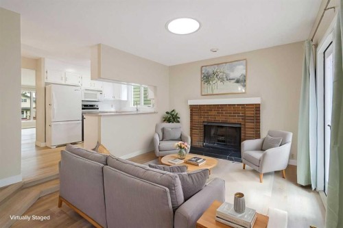1111 Berkley Drive Nw, Calgary, AB - Indoor Photo Showing Living Room With Fireplace