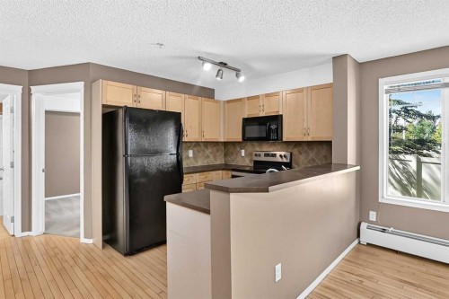 3109-70 Panamount Drive Nw, Calgary, AB - Indoor Photo Showing Kitchen