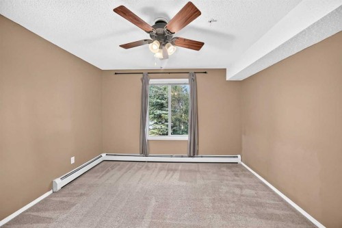 3109-70 Panamount Drive Nw, Calgary, AB - Indoor Photo Showing Other Room