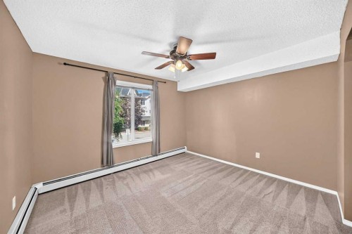 3109-70 Panamount Drive Nw, Calgary, AB - Indoor Photo Showing Other Room