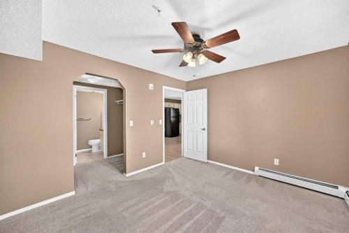 3109-70 Panamount Drive Nw, Calgary, AB - Indoor Photo Showing Other Room