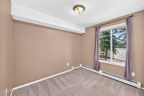 3109-70 Panamount Drive Nw, Calgary, AB - Indoor Photo Showing Other Room