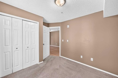 3109-70 Panamount Drive Nw, Calgary, AB - Indoor Photo Showing Other Room