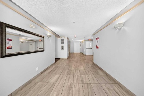 3109-70 Panamount Drive Nw, Calgary, AB - Indoor Photo Showing Other Room