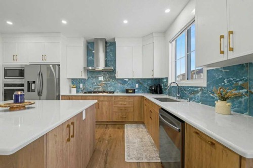 3034 Southwinds Place Sw, Airdrie, AB - Indoor Photo Showing Kitchen With Upgraded Kitchen