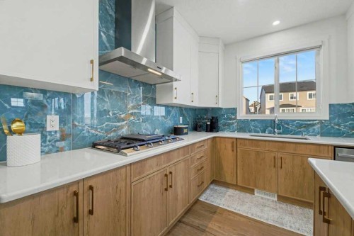 3034 Southwinds Place Sw, Airdrie, AB - Indoor Photo Showing Kitchen