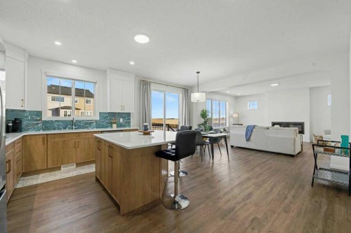 3034 Southwinds Place Sw, Airdrie, AB - Indoor Photo Showing Kitchen With Upgraded Kitchen