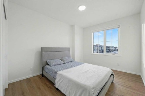 3034 Southwinds Place Sw, Airdrie, AB - Indoor Photo Showing Bedroom