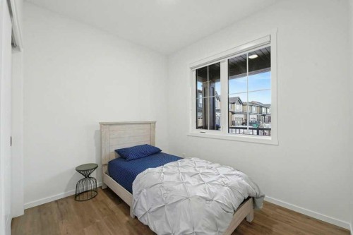 3034 Southwinds Place Sw, Airdrie, AB - Indoor Photo Showing Bedroom