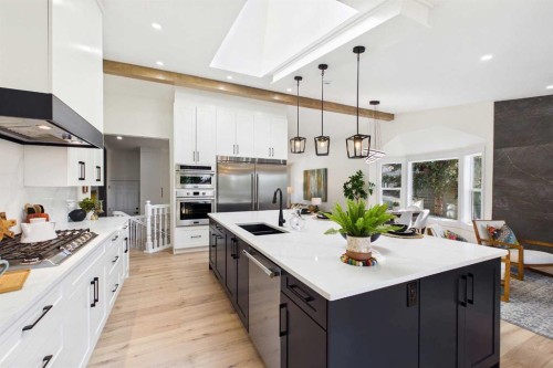 16 Edcath Mews Nw, Calgary, AB - Indoor Photo Showing Kitchen With Double Sink With Upgraded Kitchen