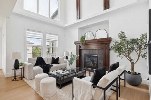 40 Val Gardena Court Sw, Calgary, AB - Indoor Photo Showing Living Room With Fireplace