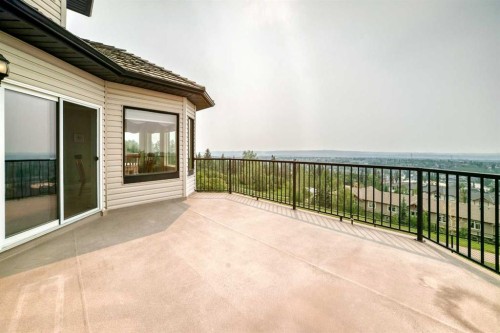 311 Rocky Ridge Drive Nw, Calgary, AB - Outdoor With Exterior