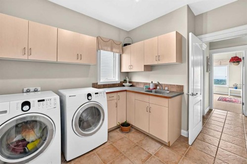 311 Rocky Ridge Drive Nw, Calgary, AB - Indoor Photo Showing Laundry Room
