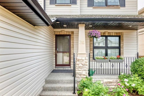 311 Rocky Ridge Drive Nw, Calgary, AB - Outdoor With Exterior