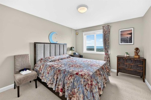 311 Rocky Ridge Drive Nw, Calgary, AB - Indoor Photo Showing Bedroom
