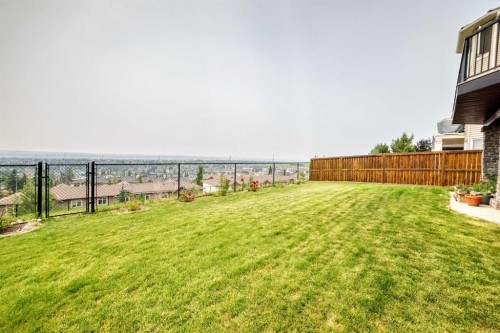 311 Rocky Ridge Drive Nw, Calgary, AB - Outdoor