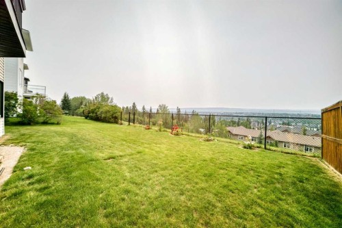 311 Rocky Ridge Drive Nw, Calgary, AB - Outdoor