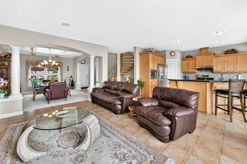 311 Rocky Ridge Drive Nw, Calgary, AB - Indoor Photo Showing Living Room