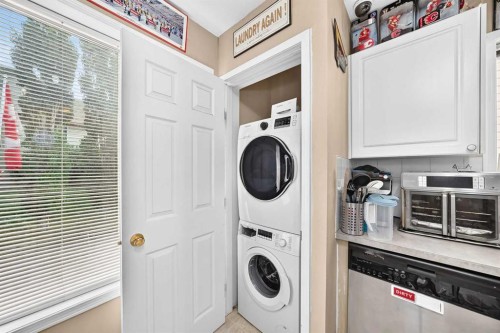 111 Arbour Stone Crescent Nw, Calgary, AB - Indoor Photo Showing Laundry Room