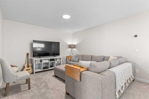 45 Savoy Landing Se, Calgary, AB - Indoor Photo Showing Living Room