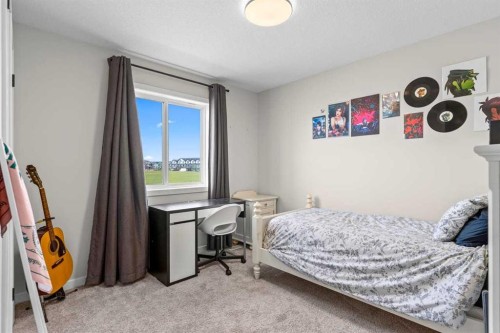 45 Savoy Landing Se, Calgary, AB - Indoor Photo Showing Bedroom