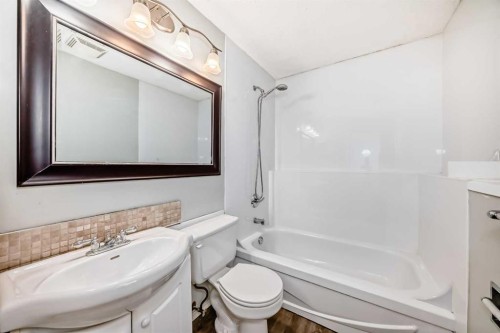 323 Falwood Way Ne, Calgary, AB - Indoor Photo Showing Bathroom