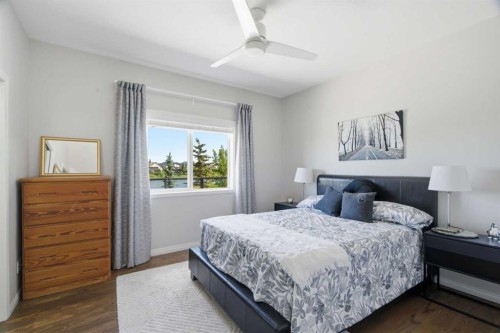124 West Creek Glen, Chestermere, AB - Indoor Photo Showing Bedroom
