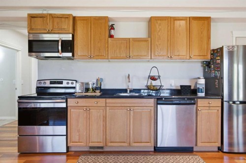 124 West Creek Glen, Chestermere, AB - Indoor Photo Showing Kitchen With Stainless Steel Kitchen With Double Sink