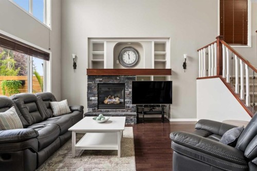 391 Auburn Bay Heights Se, Calgary, AB - Indoor Photo Showing Living Room With Fireplace