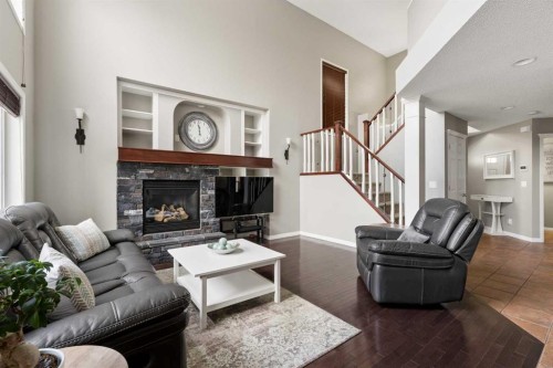 391 Auburn Bay Heights Se, Calgary, AB - Indoor Photo Showing Living Room With Fireplace