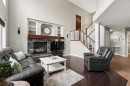 391 Auburn Bay Heights Se, Calgary, AB  - Indoor Photo Showing Living Room With Fireplace 
