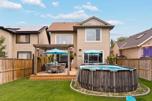 391 Auburn Bay Heights Se, Calgary, AB - Outdoor With Above Ground Pool With Deck Patio Veranda With Exterior