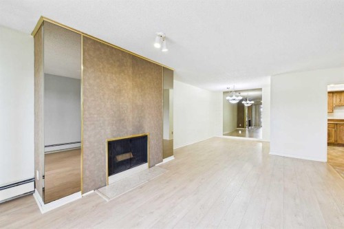 212-3730 50 Street Nw, Calgary, AB - Indoor With Fireplace