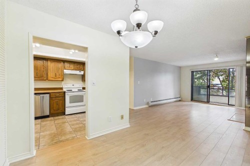 212-3730 50 Street Nw, Calgary, AB - Indoor Photo Showing Kitchen