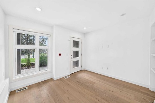 108-1632 20 Avenue Nw, Calgary, AB - Indoor Photo Showing Other Room