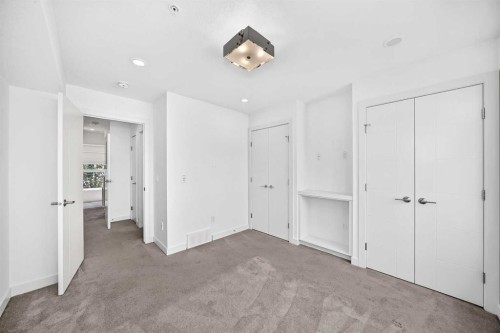 108-1632 20 Avenue Nw, Calgary, AB - Indoor Photo Showing Other Room