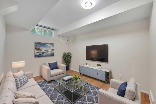 1415 Rosehill Drive Nw, Calgary, AB - Indoor Photo Showing Living Room