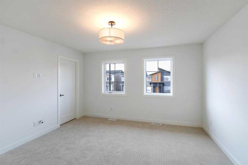 198 Dawson Harbour Hill, Chestermere, AB - Indoor Photo Showing Other Room